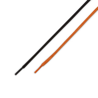 Two flat shoelaces, one black and one orange with a white dotted pattern, shown diagonally on a plain white background.