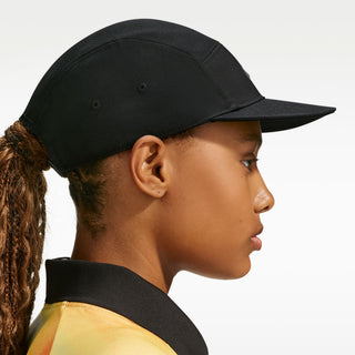 Nike SB Unstructured Skate Cap in Black — heavyweight 100% cotton, 5-panel design, adjustable webbed strap, embroidered eyelets, low-profile athletic fit