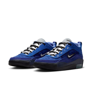 Blue and black sneakers with a white logo on a white background