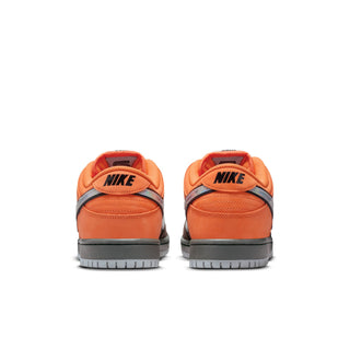 Nike SB Dunk Low Pro in safety orange, wolf grey, and baroque brown with classic color blocking and padded low-top design.