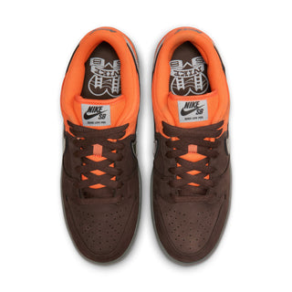 Nike SB Dunk Low Pro in safety orange, wolf grey, and baroque brown with classic color blocking and padded low-top design.