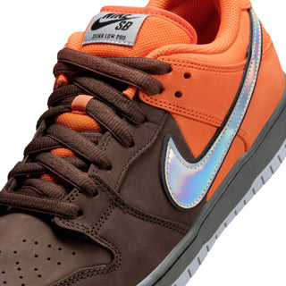 Nike SB Dunk Low Pro in safety orange, wolf grey, and baroque brown with classic color blocking and padded low-top design.