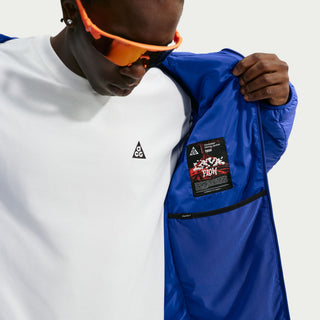 Nike ACG Lava Flow Therma-FIT ADV Hooded Jacket in Old Royal/Summit White — PrimaLoft® insulated, water-repellent, packable hooded jacket with ACG triangle carabiner, bungee waist, two-way zipper, and brushed collar lining
