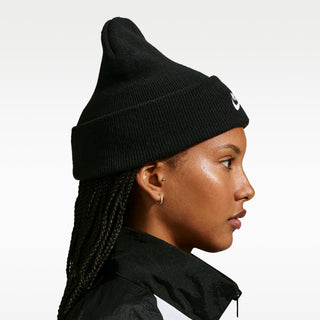 “Black Nike SB Peak knit beanie with a folded cuff and white embroidered Nike SB logo.”