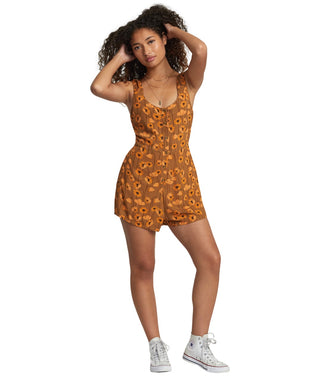 A stylish and eco-friendly RVCA Valley Romper for Women made from Ecovero viscose fabric, featuring a fitted waist, scoop neck, and side pockets.
