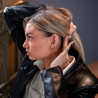 ALCO Venn huggies in intermix finish with 18K gold-plated stainless steel and hinged clasp for versatile style.