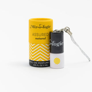 Assured Natural Perfume 1 mL Mini Rollerball by Mixologie, featuring marine, patchouli, and sandalwood notes.
