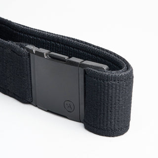Arcade Atlas Stretch Belt in Black with patented A2 buckle, performance stretch, and sustainable REPREVE®️ material.