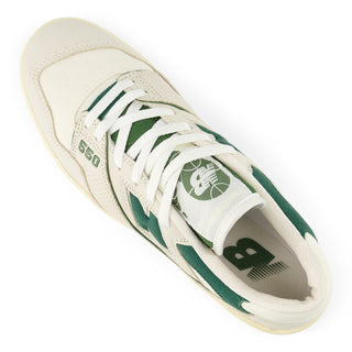 New Balance 550 sneaker in Permafrost and Dark Alpine Green with leather upper, rubber outsole, and retro low-top style.