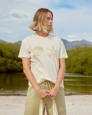 Billabong oversized white crewneck t-shirt with short sleeves and small front graphic in soft cotton knit fabric.