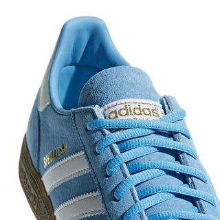 Blue Adidas sneaker with white stripes on a white background