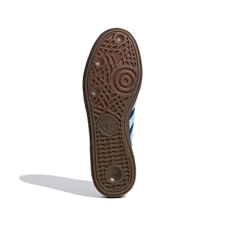Close-up of an Adidas shoe sole on a light gray background