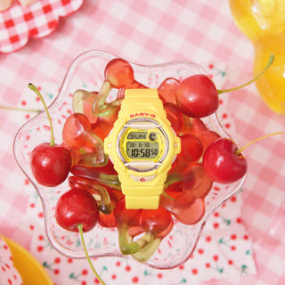 G-SHOCK BABY-G BG169CH-9 in Yellow with cherry red accents — compact round resin watch with LED cherry display, 200m water resistance, and shock-resistant construction