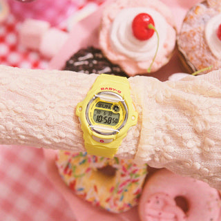 G-SHOCK BABY-G BG169CH-9 in Yellow with cherry red accents — compact round resin watch with LED cherry display, 200m water resistance, and shock-resistant construction