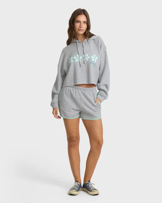 Billabong cropped heather gray hoodie with boxy fit, drawcord hood, ribbed trims, and front graphic detail.