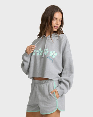 Billabong cropped heather gray hoodie with boxy fit, drawcord hood, ribbed trims, and front graphic detail.
