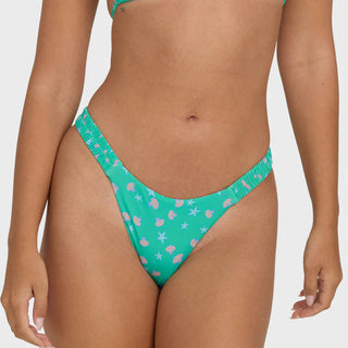Billabong Ship Wrecked Sunni Bikini Bottoms in Green Tropics, high-leg scrunch side seam bikini bottom in 82% partially recycled polyester 18% spandex knit with slim sides, super cheeky back coverage, and logo embroidery at center back