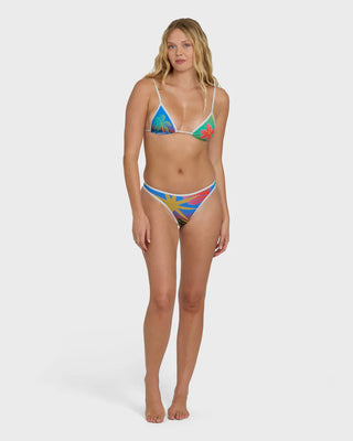Woman wearing a colorful bikini on a white background