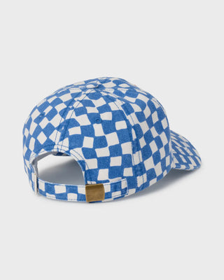 Blue and white checkered cap on a light gray background