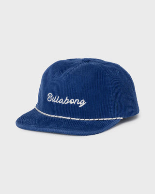 Blue cap with 'Billabong' logo on a light gray background