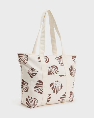 Billabong cotton canvas tote bag in salt crystal color with logo patch, long straps, and spacious interior.