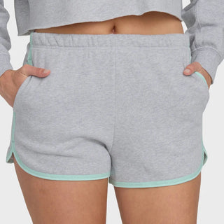 Billabong heather gray fleece shorts with dolphin hem, contrast trim, elastic waistband, and soft fabric construction.

