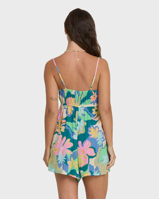 Billabong In A Twist Romper in Blue Multi — sleeveless crinkle viscose romper with twist-front bodice, peekaboo cut-out, and smocked back in a sun-faded blue print