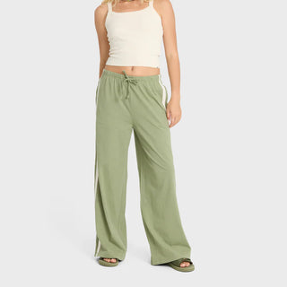 Billabong Wave Stamp Knit Pants in Army Green — wide leg mid-rise fit with elastic drawcord waist and contrast side taping in 100% cotton jersey knit