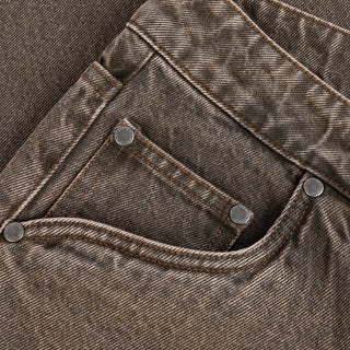 Dime sandblasted brown baggy denim pants with western front pockets, wavy back pockets, and embroidered accents.