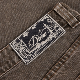 Dime sandblasted brown baggy denim pants with western front pockets, wavy back pockets, and embroidered accents.