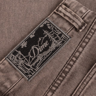 Dime Straight Denim Pants in brown washed with embroidered logos and wavy back pockets
