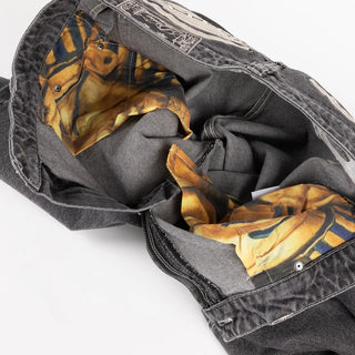 Dime Baggy Wink Denim Pants in Faded Black — 100% cotton with western pockets, wavy patch back pockets, logo embroidery, King Tut printed pocket bags, and embroidered waistband patch