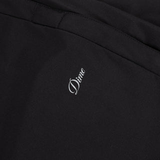 Dime Athletic Snap Pants in Black/Red — polyester/spandex blend with snap side seam plackets, integrated pockets, contrast mesh lining, 3M branding, cinched leg openings, and elasticated speckled drawstring waistband
