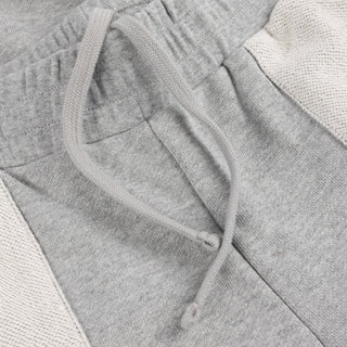Front view of Dime Reversed Terry Cargo Sweatpants in Ash with contrasting light appliqué pockets, an elasticated waistband, and drawstrings at the leg openings