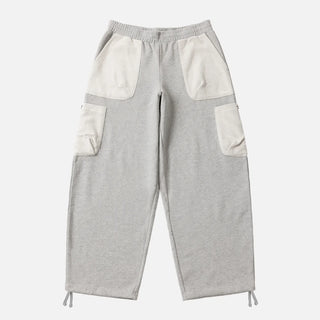 Front view of Dime Reversed Terry Cargo Sweatpants in Ash with contrasting light appliqué pockets, an elasticated waistband, and drawstrings at the leg openings