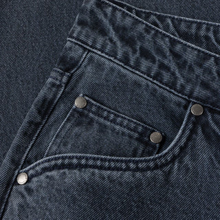 Overdyed blue Dime baggy denim pants with loose fit, classic five-pocket style, and subtle embroidered branding.
