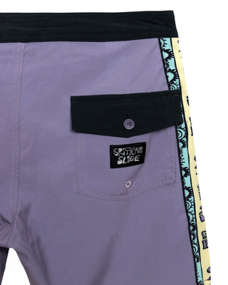 Purple shorts with a black pocket and 'Critical Slide' logo on a white background