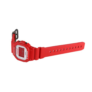 Limited-edition G-SHOCK watch with Coca-Cola branding, vibrant red display.