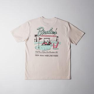 Drift House Birdies & Boardshorts Tee in Ecru, featuring a Space Coast golf benefit back graphic with surfboards, palm trees, and a rocket.