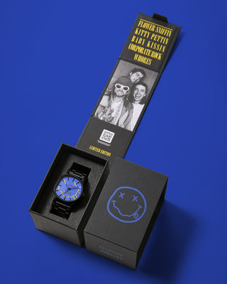 Nixon watch with Nirvana design on a blue face