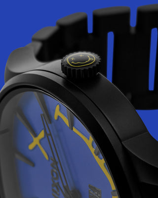 Nixon watch with Nirvana design on a blue face