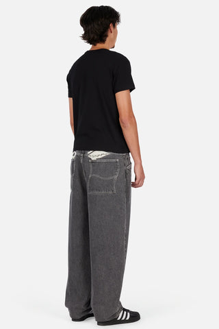 Dime Baggy Wink Denim Pants in Faded Black — 100% cotton with western pockets, wavy patch back pockets, logo embroidery, King Tut printed pocket bags, and embroidered waistband patch