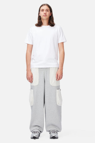 Front view of Dime Reversed Terry Cargo Sweatpants in Ash with contrasting light appliqué pockets, an elasticated waistband, and drawstrings at the leg openings