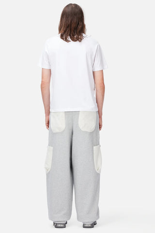 Front view of Dime Reversed Terry Cargo Sweatpants in Ash with contrasting light appliqué pockets, an elasticated waistband, and drawstrings at the leg openings