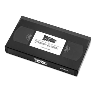 Casio Vintage CA500WEBF-1A Back to the Future edition watch with calculator design, silver case, and DeLorean-inspired detailing.