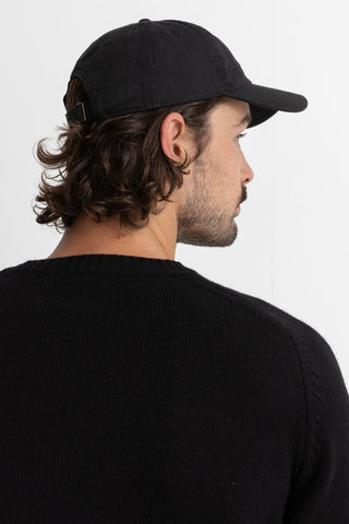 Rhythm Classic Cap in Vintage Black, 100% cotton, five-panel, sun logo embroidery, adjustable strap with metal slider.