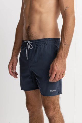 Navy recycled polyester beach shorts with mesh drainage pockets.