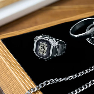 Casio CRW001-1 50th Anniversary Ring Watch with digital display, metal case, dual time, stopwatch, and adjustable sizing.