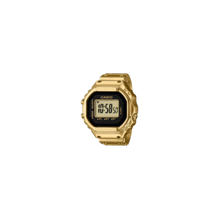 Gold Casio digital watch on a white background