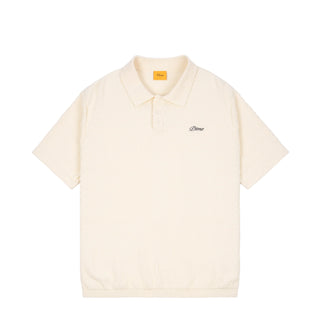 Cream Dime Wave Knit Polo with cursive chest logo, ribbed sleeves and hem, in a Lyocell-Cotton blend.